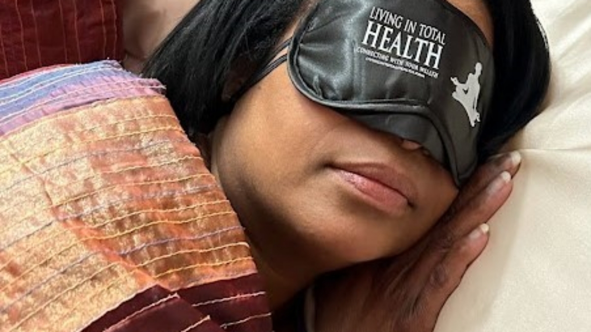 Glen Alex asleep in the Living In Total Health Sleep Mask